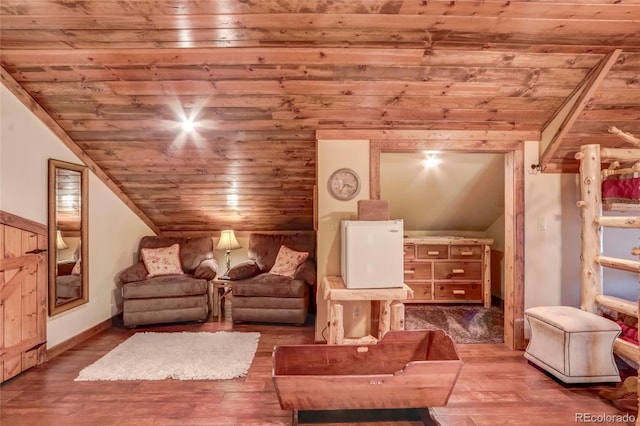 sitting room with lofted ceiling, wood ceiling, and hardwood / wood-style floors