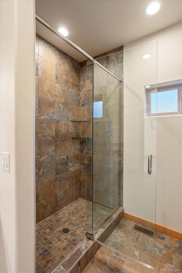 133 Starbuck Cir, Salida, CO 81201 - full bathroom featuring a shower stall, stone finish floors, and recessed lighting