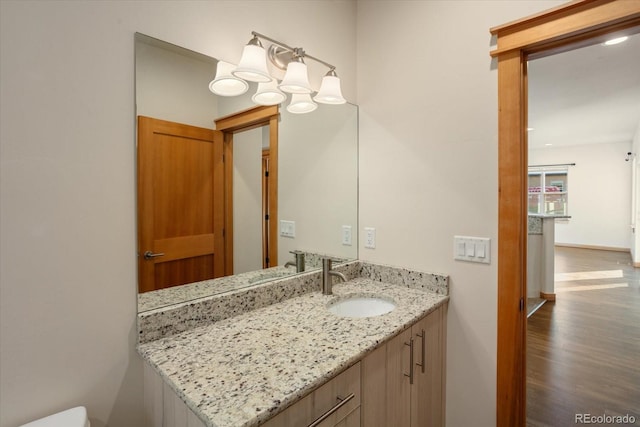 133 Starbuck Cir, Salida, CO 81201 - half bath featuring wood finished floors and vanity