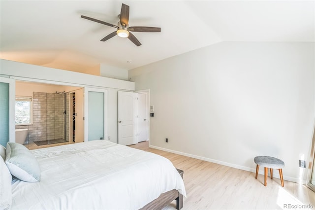 bedroom featuring vaulted ceiling, light wood finished floors, baseboards, and ceiling fan