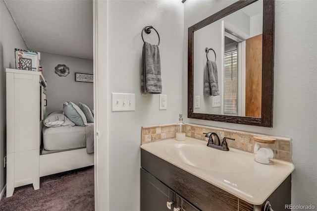 bathroom featuring backsplash and vanity