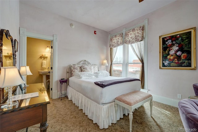 204 N F St Unit D3, Salida, CO 81201 - bedroom featuring light carpet and connected bathroom