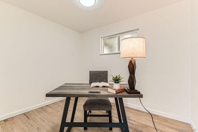 3871 Moore St, Wheat Ridge, CO 80033 - office with baseboards and wood finished floors