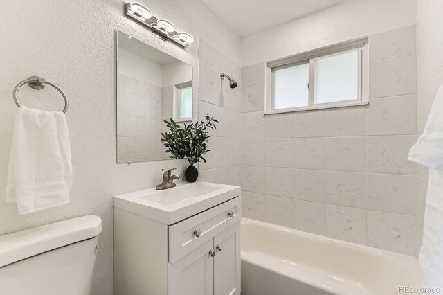 3871 Moore St, Wheat Ridge, CO 80033 - full bath featuring toilet, shower / bathtub combination, and vanity