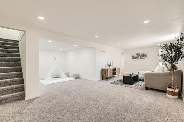 3871 Moore St, Wheat Ridge, CO 80033 - carpeted living area featuring stairs, recessed lighting, and baseboards