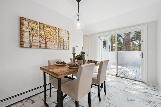 tiled dining space with baseboard heating