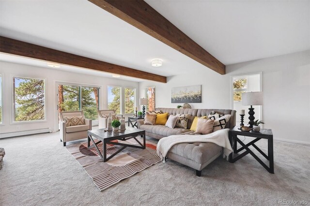 living room with beamed ceiling, a baseboard heating unit, and light colored carpet