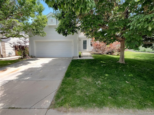 5966 S Winnipeg St, Aurora, CO 80015 - obstructed view of property with a garage, a front yard, and driveway