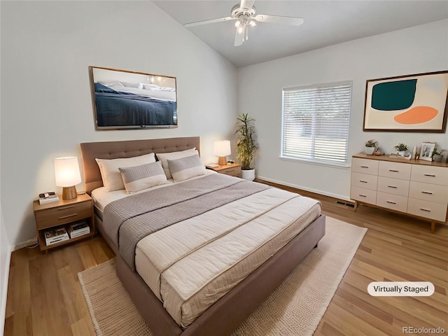 5966 S Winnipeg St, Aurora, CO 80015 - bedroom featuring vaulted ceiling, light wood-style floors, and a ceiling fan