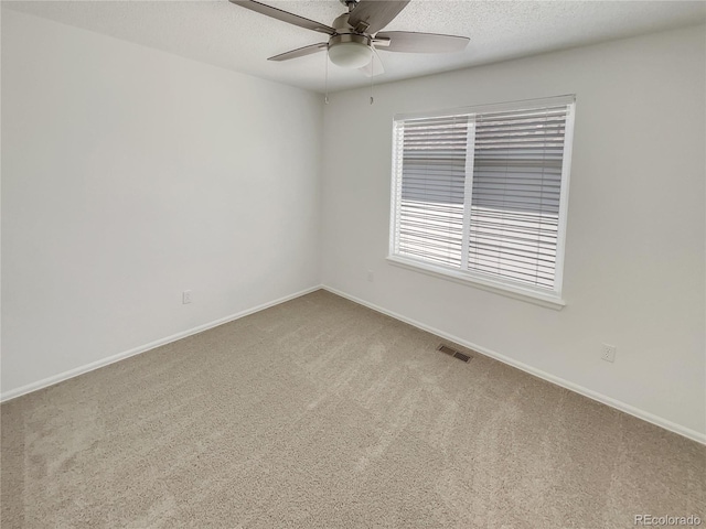 5966 S Winnipeg St, Aurora, CO 80015 - spare room with carpet, a ceiling fan, and a textured ceiling
