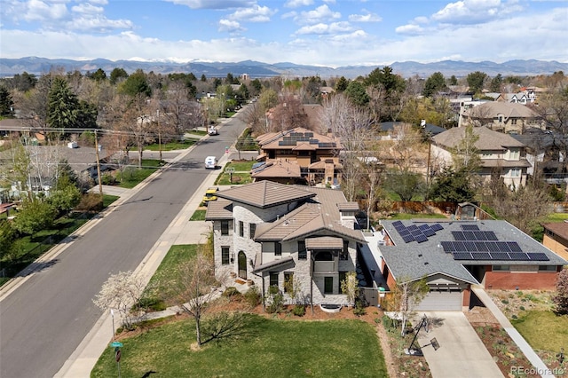 drone / aerial view with a mountain view and a residential view