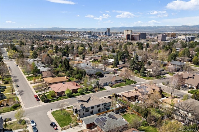 birds eye view of property with a mountain view