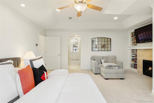 bedroom featuring a raised ceiling, recessed lighting, visible vents, and carpet floors