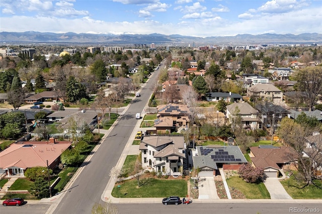 birds eye view of property featuring a mountain view and a residential view