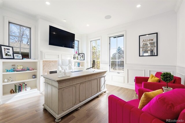 5455 E Cedar Ave, Denver, CO 80246 - office featuring ornamental molding, healthy amount of natural light, wood finished floors, a decorative wall, and wainscoting