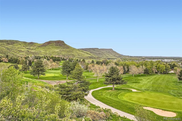 15325 W 32nd Ave, Golden, CO 80401 - surrounding community with a lawn, golf course view, and a mountain view