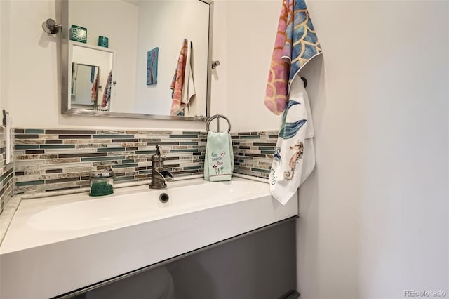 15325 W 32nd Ave, Golden, CO 80401 - bathroom with tasteful backsplash and vanity