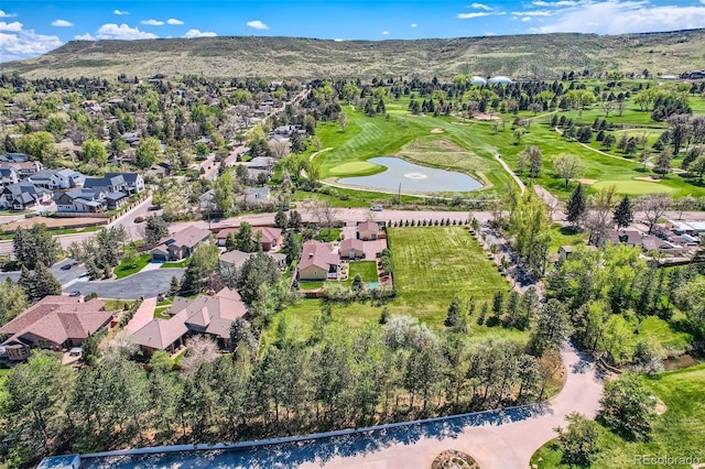15325 W 32nd Ave, Golden, CO 80401 - aerial view of property's location featuring a water and mountain view, nearby suburban area, and a golf course