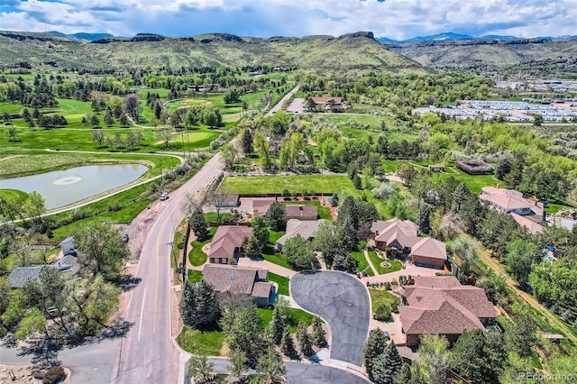 15325 W 32nd Ave, Golden, CO 80401 - aerial perspective of suburban area with a water and mountain view