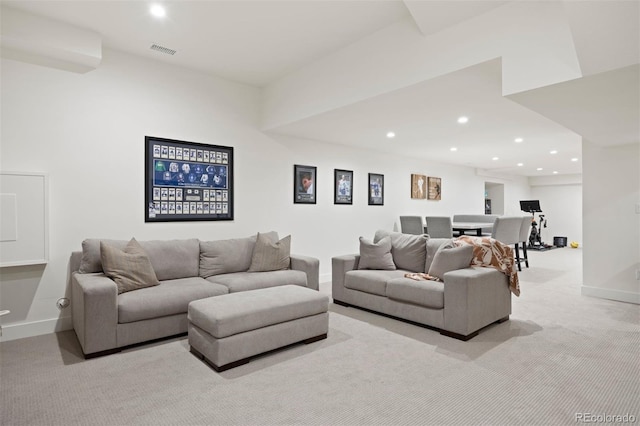 living room featuring light colored carpet