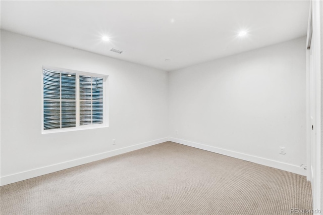 view of carpeted spare room