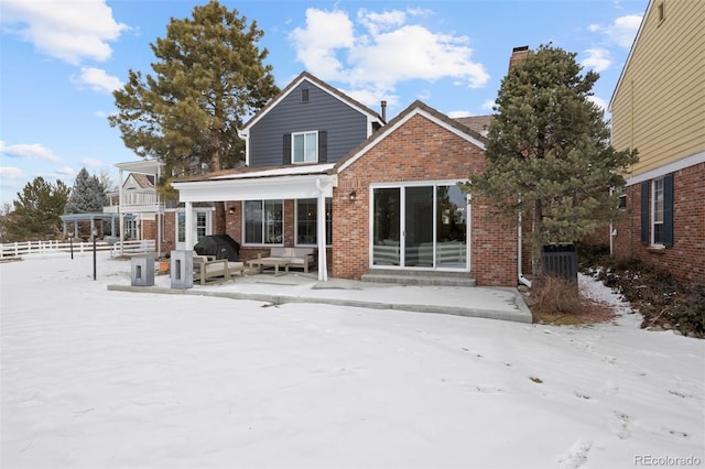 view of snow covered property