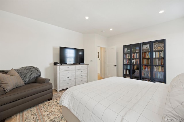 7079 S Locust Pl, Centennial, CO 80112 - bedroom featuring recessed lighting and wood finished floors