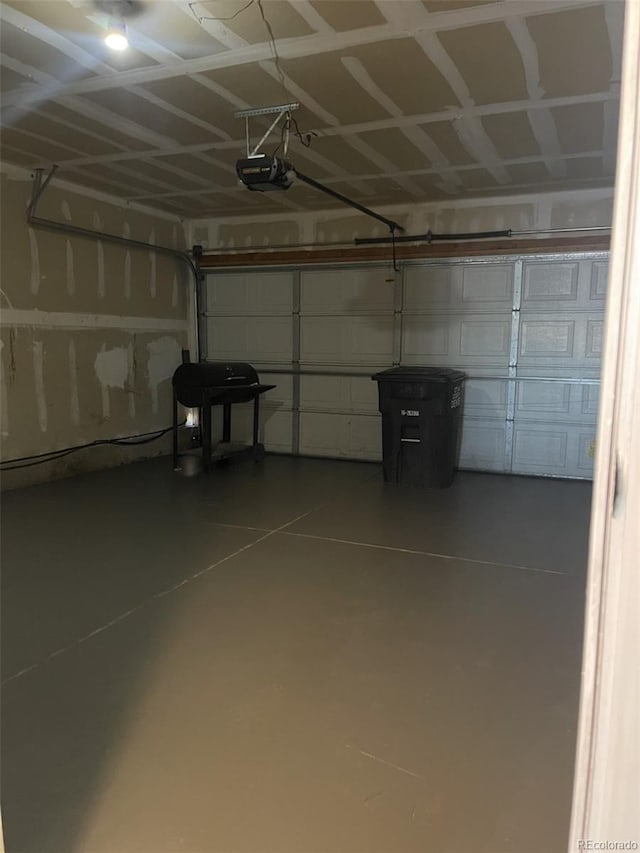 garage featuring a garage door opener