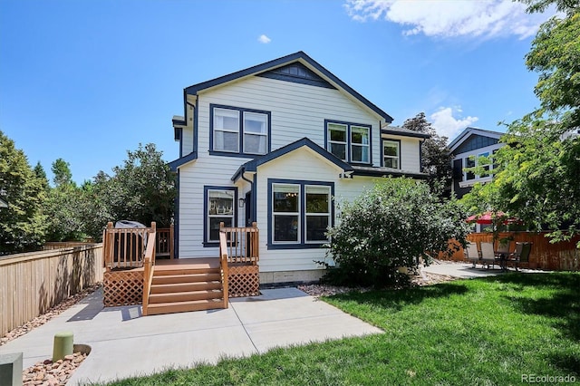 10955 Dearborne Dr, Parker, CO 80134 - back of house featuring a patio area, a fenced backyard, and a wooden deck