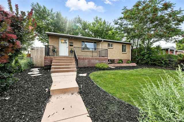 2025 Otis St, Edgewater, CO 80214 - view of front of home featuring brick siding