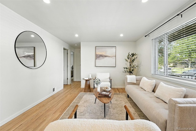2025 Otis St, Edgewater, CO 80214 - living room with recessed lighting and light wood finished floors