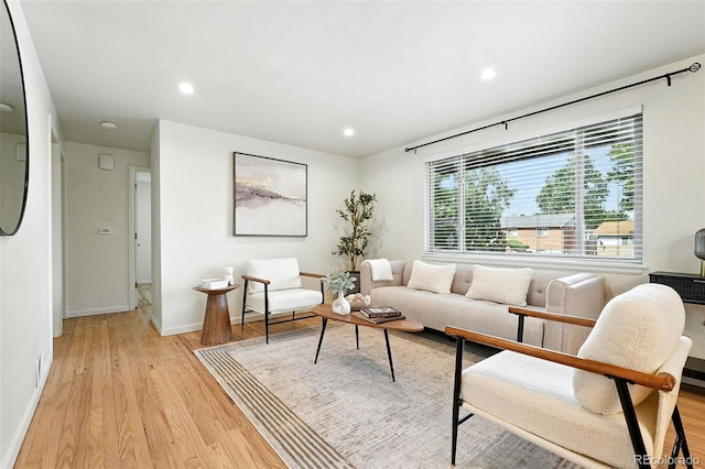 2025 Otis St, Edgewater, CO 80214 - living area featuring light wood-style floors and recessed lighting