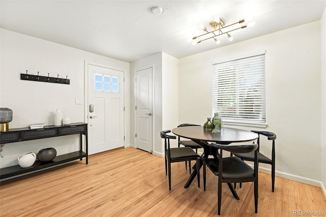 2025 Otis St, Edgewater, CO 80214 - dining area with light wood-type flooring and baseboards