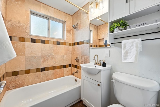 2025 Otis St, Edgewater, CO 80214 - full bathroom featuring vanity and bathing tub / shower combination