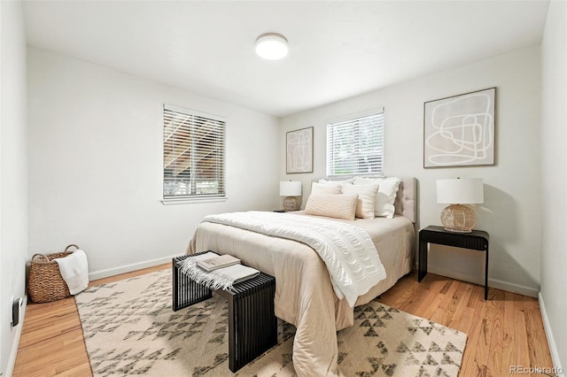 2025 Otis St, Edgewater, CO 80214 - bedroom with light wood finished floors