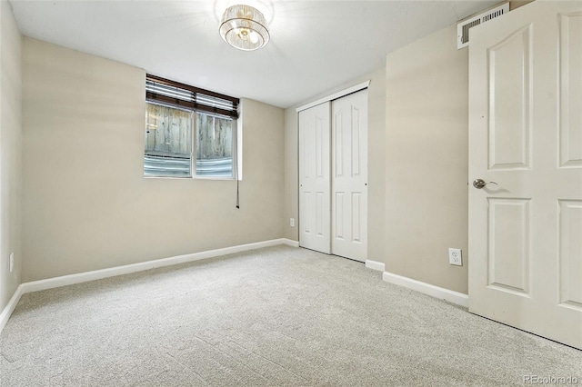 2025 Otis St, Edgewater, CO 80214 - unfurnished bedroom featuring carpet and a closet