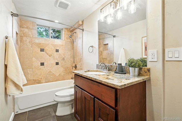 2025 Otis St, Edgewater, CO 80214 - bathroom featuring shower / tub combination, vanity, and tile patterned flooring