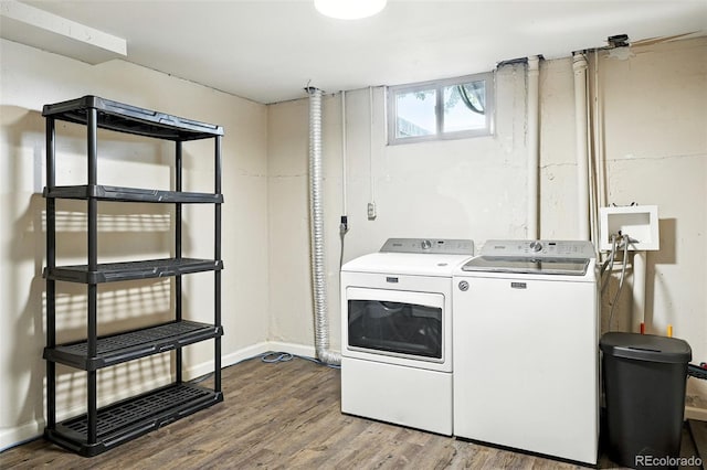 2025 Otis St, Edgewater, CO 80214 - laundry area featuring washer and clothes dryer and wood finished floors
