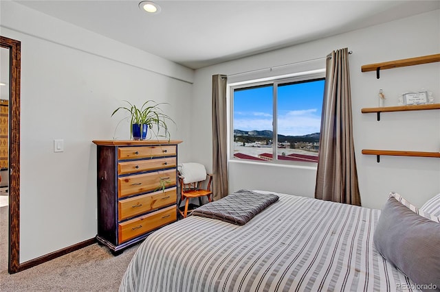 bedroom with light carpet