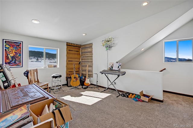 interior space featuring vaulted ceiling and carpet floors