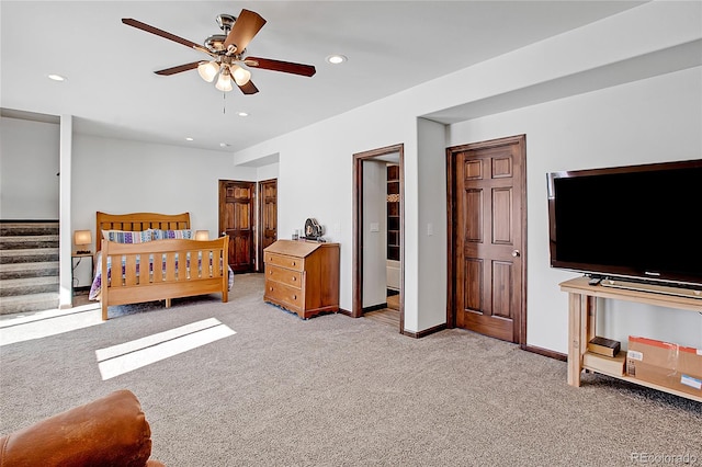 bedroom with light carpet and ceiling fan