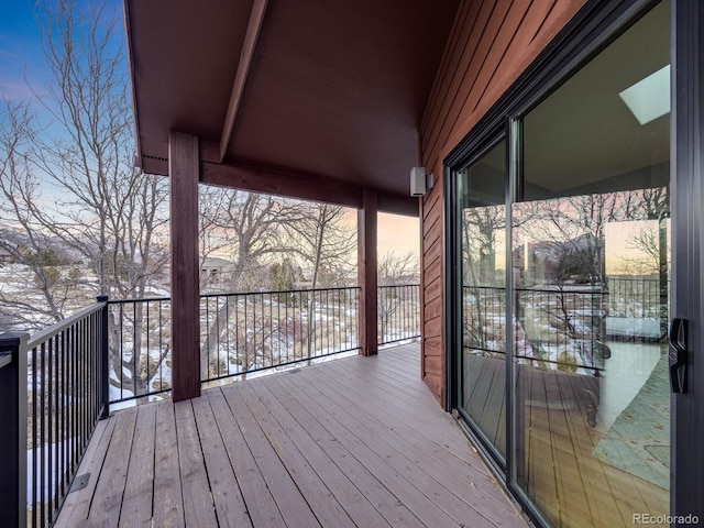 view of snow covered deck