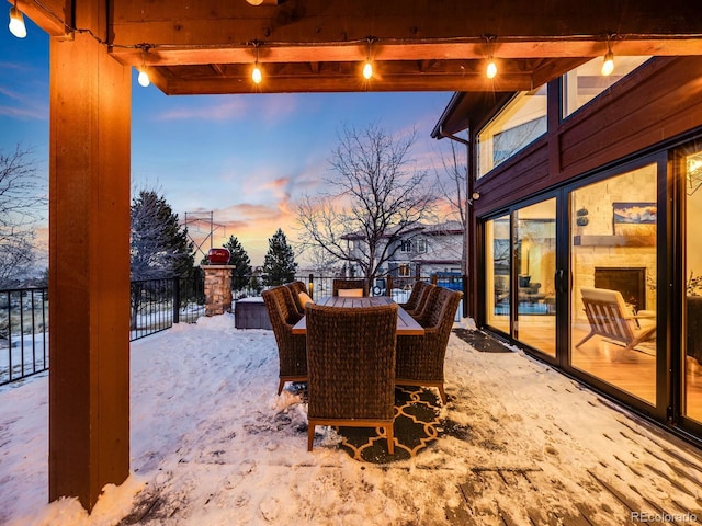 view of snow covered patio