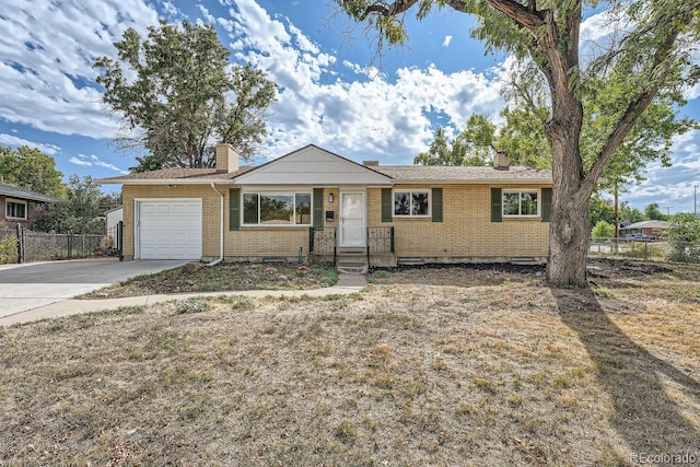 ranch-style home with a garage