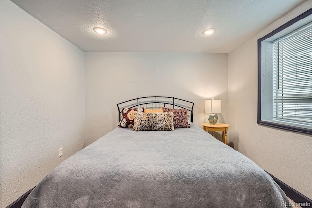 bedroom with a textured ceiling