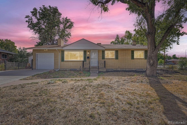 ranch-style home with a garage