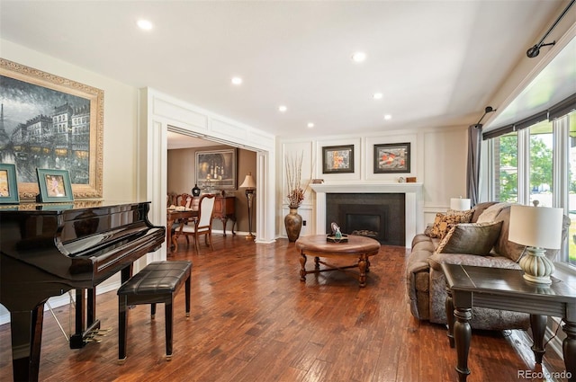 living area featuring hardwood / wood-style floors