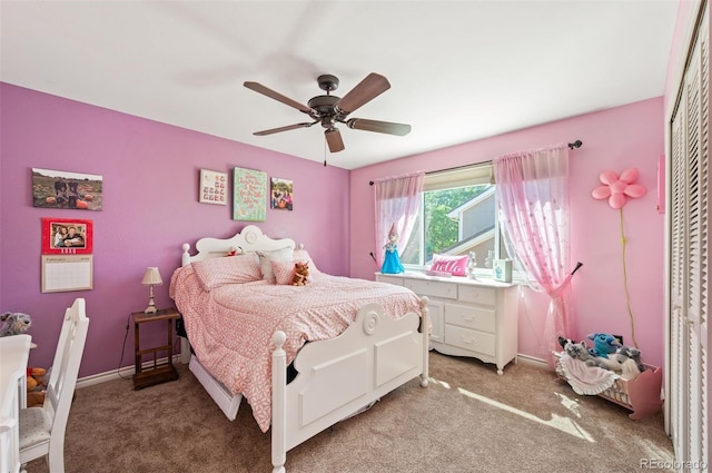 carpeted bedroom featuring ceiling fan