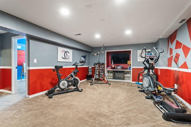 workout room featuring carpet floors