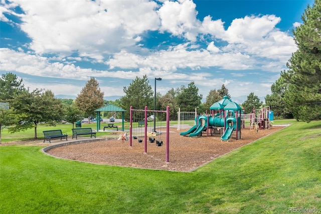 view of play area featuring a lawn